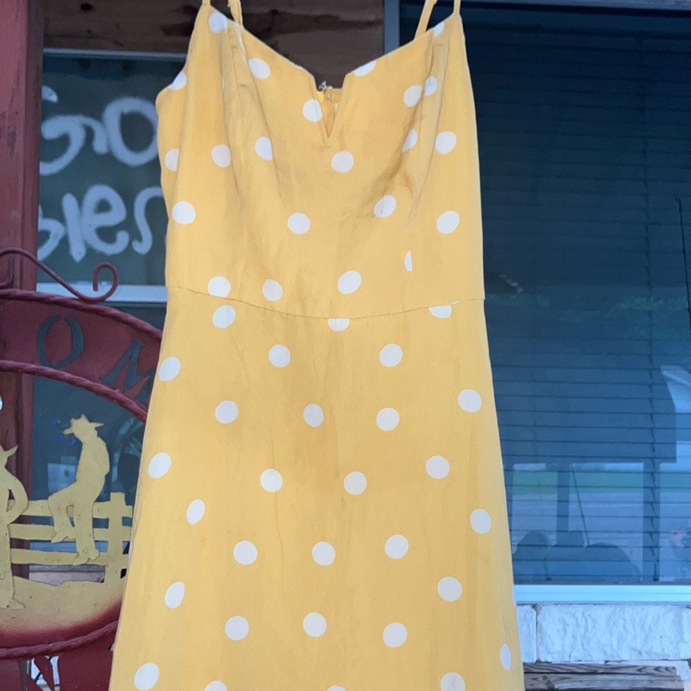 Yellow dress with white polka dots